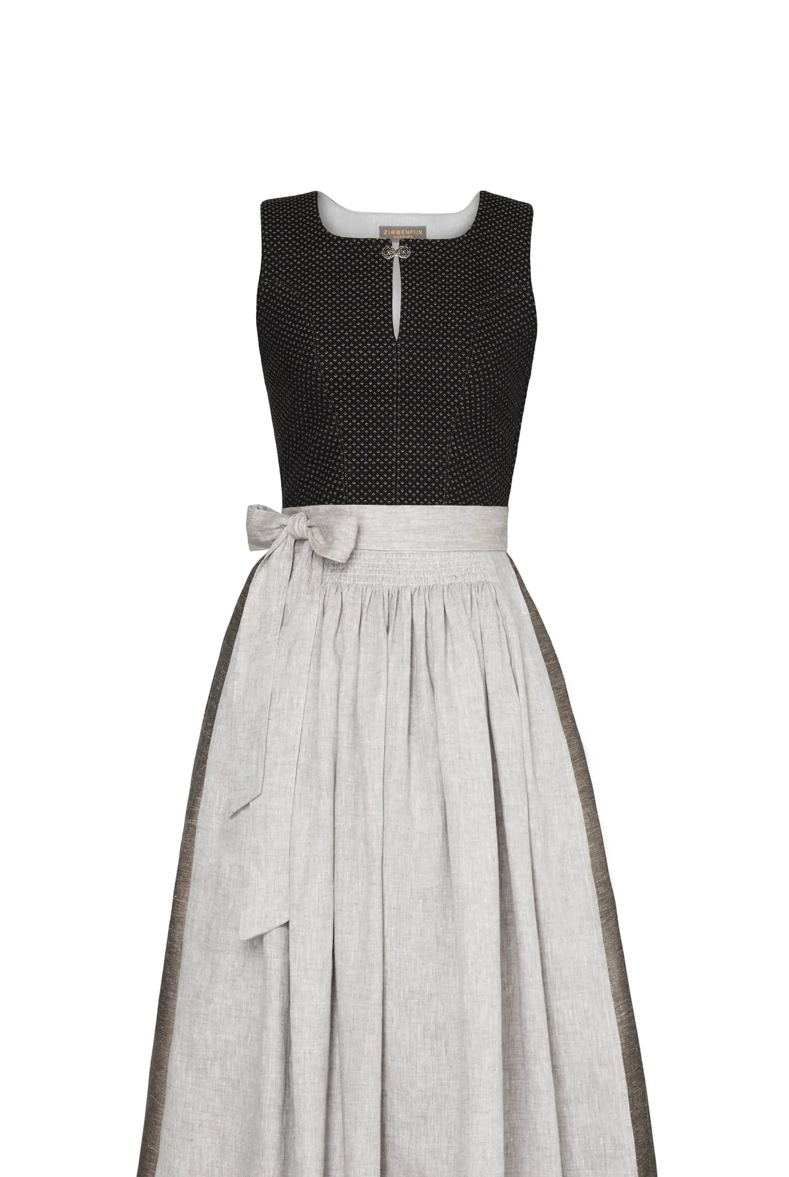 Mieder Marlene aus schwarzer Schurwolle, kombiniert mit Rock Marlene und naturfarbener Leinenschürze – Frontansicht als Freisteller, handgefertigt in München von Zirbenfux