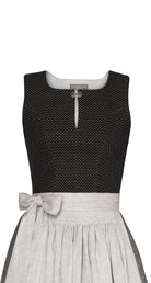 Nahaufnahme des hochgeschlossenen Mieders Marlene aus schwarzer Schurwolle – Frontansicht als Freisteller, detailreich gearbeitet, handgefertigt in München von Zirbenfux